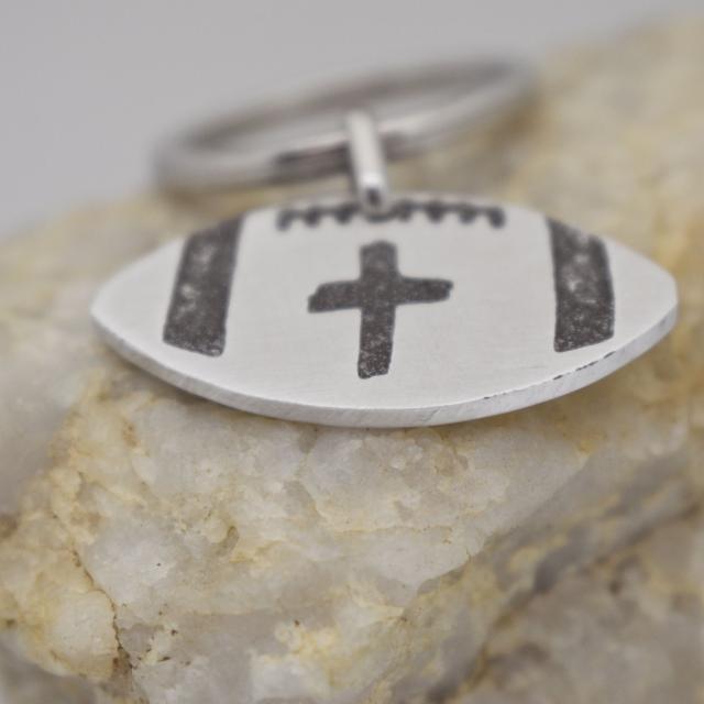 Football cross aluminum keychain.jpg